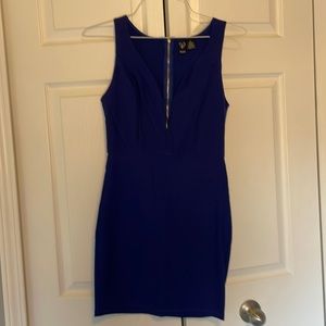 Beautiful Windsor royal blue cocktail dress. Sleeveless plunging v neck line